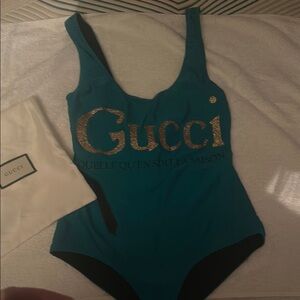 Gucci Teal Swimsuit with Glittering Gold Logo